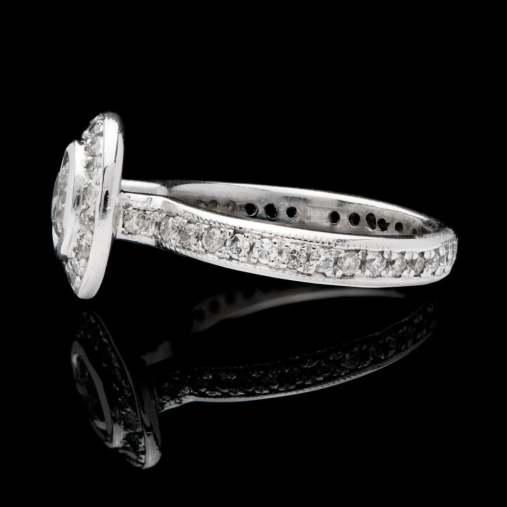 14Kt White Gold 0.60 Carat Round Brilliant Diamond Halo Ring