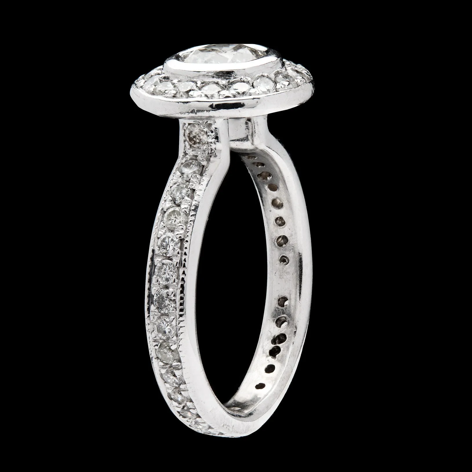 14Kt White Gold 0.60 Carat Round Brilliant Diamond Halo Ring