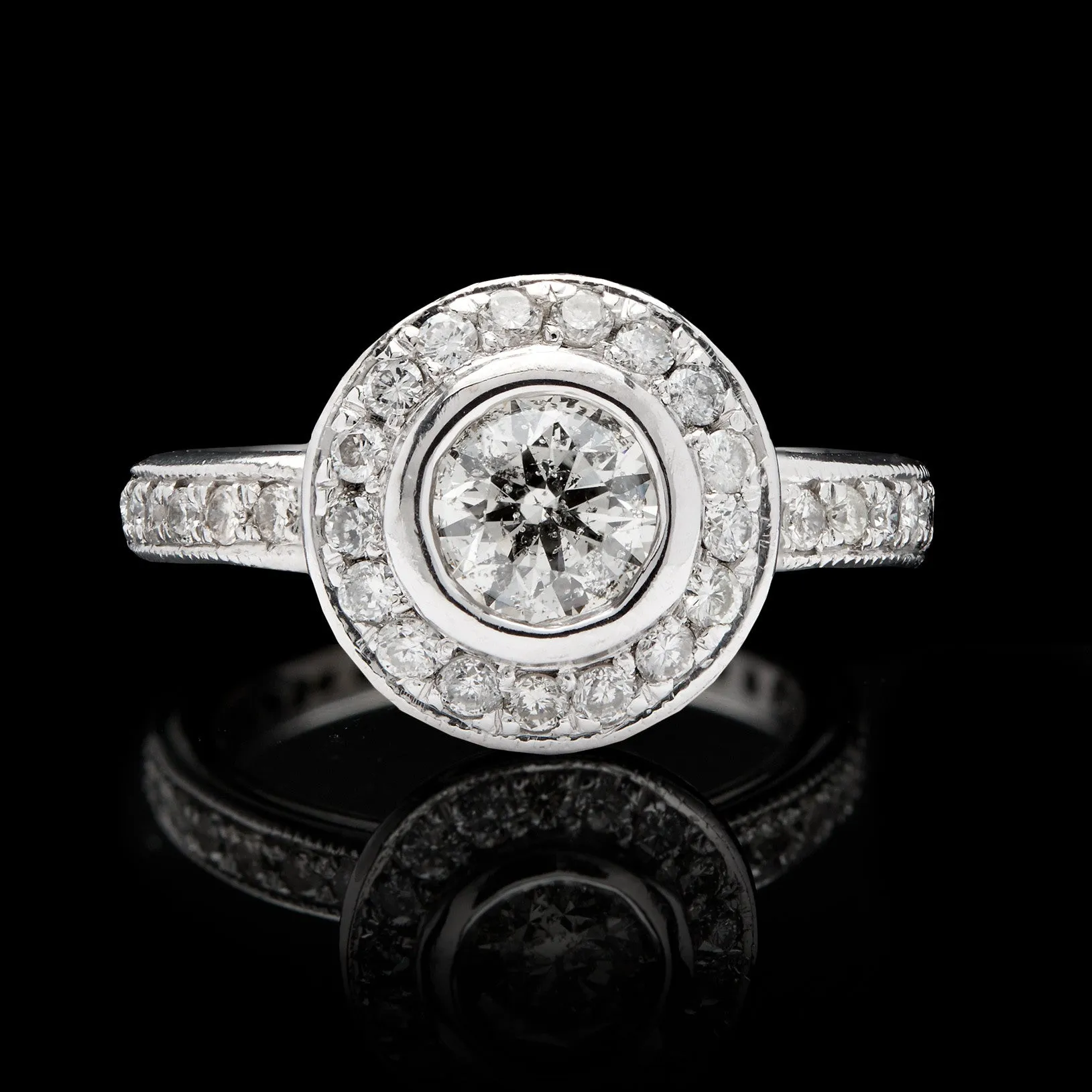 14Kt White Gold 0.60 Carat Round Brilliant Diamond Halo Ring