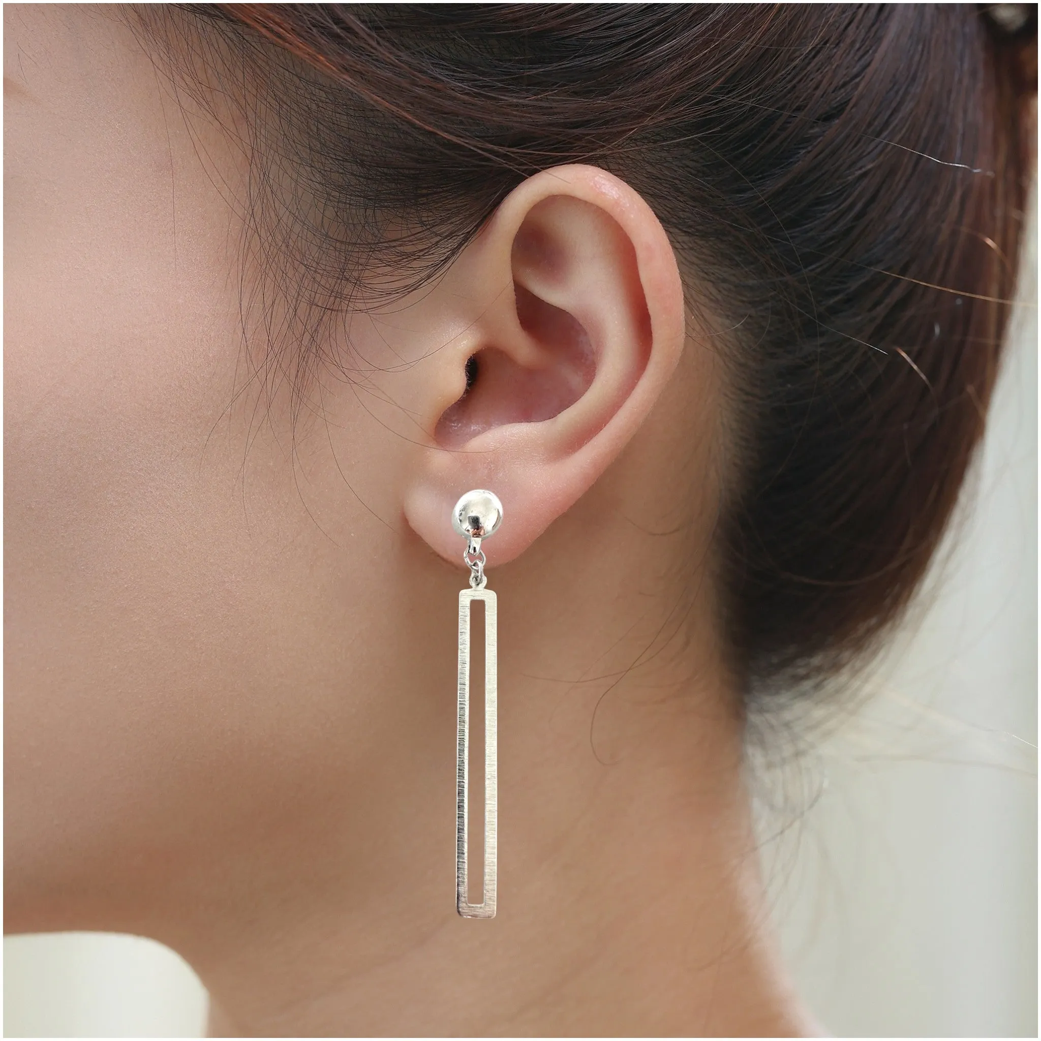 TI-Go Silver rectangular loop earring