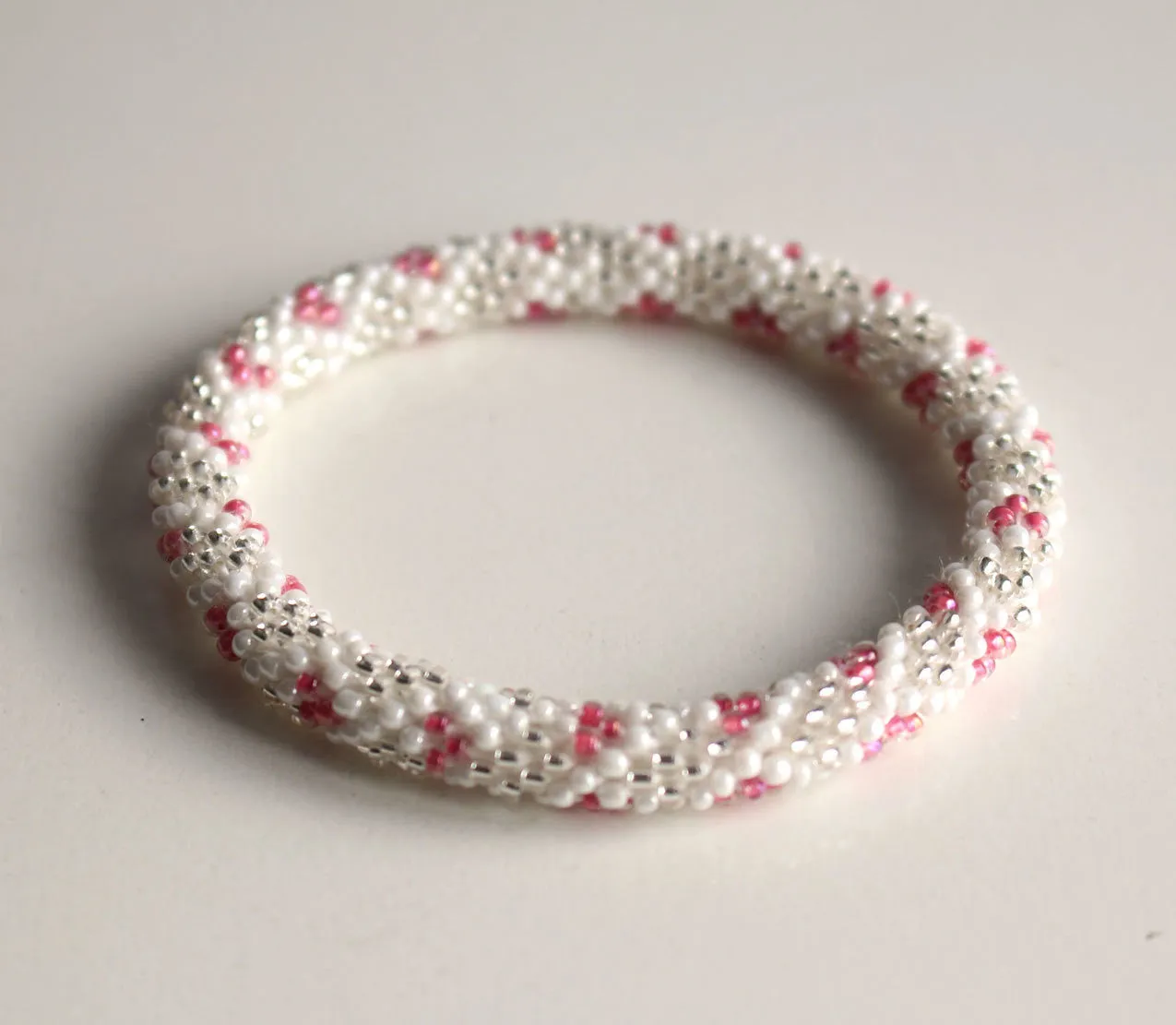 White Silver and Pink Crocheted Beads Roll On Bracelet